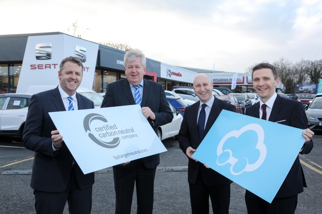 Northern Ireland’s largest family-owned new and used vehicle retailer Donnelly Group is celebrating after becoming the first dealer group locally to go ‘carbon neutral’ after joining the new Castrol Carbon Neutral Programme supported by BP Target Neutral. Making the announcement, from left, Donnelly Group Managing Director Dave Sheeran and Director Raymond Donnelly; Stephen Walker, National Key Account Manager, Castrol and Michael Capper, Global Development, BP Target Neutral. Donnelly Group is offering customers purchasing a vehicle from any one of its 18 manufacturers across the group’s eight locations in Northern Ireland, the opportunity to drive completely carbon neutral for the first year of ownership, by calculating and offsetting the carbon footprint of their first 10,000 miles, by investing in projects to reduce pollution in some of the most impoverished parts of the world.