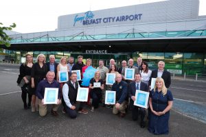 Finalists pictured with juding panel at Belfast City Airport