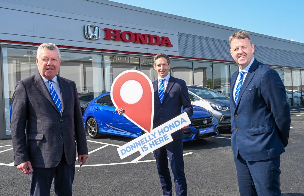 Terence Donnelly, Executive Chairman of the Donnelly Group, Paul Compton, Site Director, and Dave Sheeran, Managing Director of Donnelly Group, mark the opening of the new Donnelly Honda showroom on the Boucher Road.